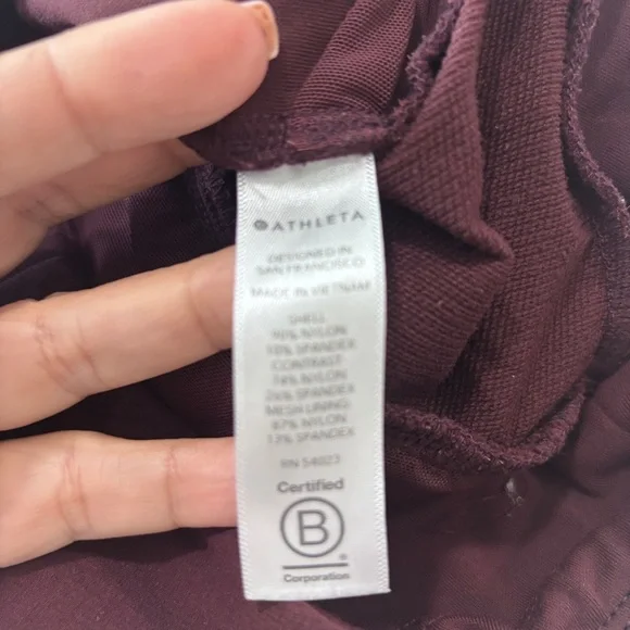 Athleta Headlands Hybrid Tight Sz 4 Burgundy Wine High Rise Zip Pockets Skinny - Picture 7 of 9